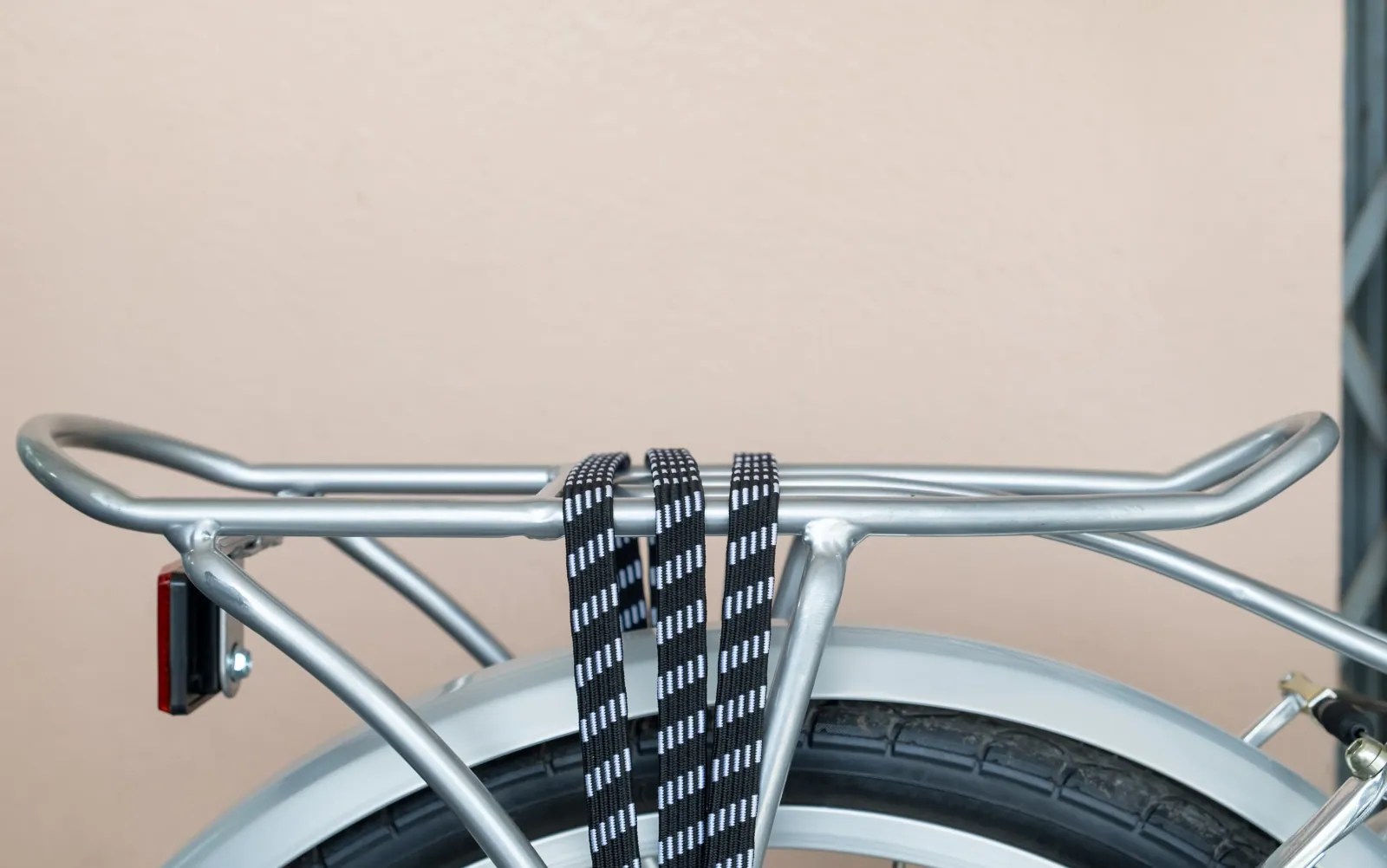 A Ryden-branded fender pair and commuter rear rack on a neutral surface, ready for private-label branding