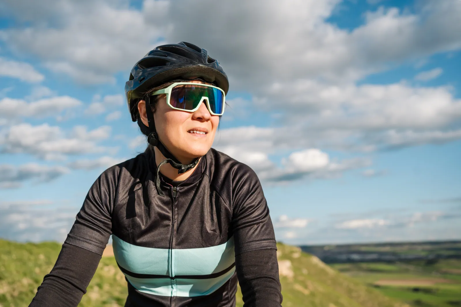 Ryden-branded performance cycling sunglasses arranged for shop-branded private label